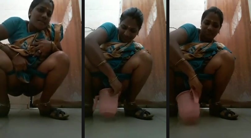 Tamil aunty toilet video washing chut | Watch Tamil aunty toilet video making her solo video washing chut. Holding the cam inside toilet; she captures her sexy face to start the show.