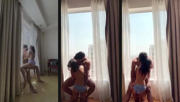 The horny couple fucks in the balcony in Indian MMS porn