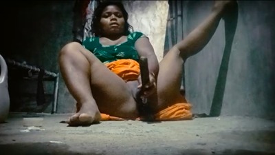Desi sex of a village lady taking two brinjals in two holes